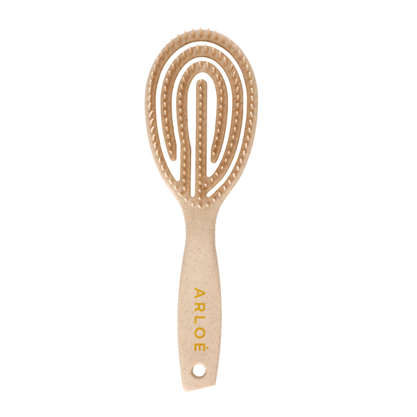 Hairbrush with rounded handle and textured head on a white background, branded 'ARLOE'.