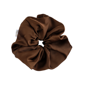 Brown scrunchie on a white background
