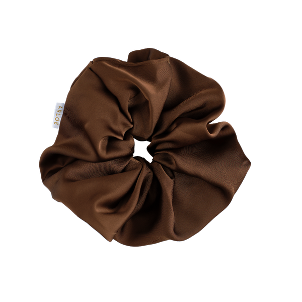 Brown scrunchie on a white background