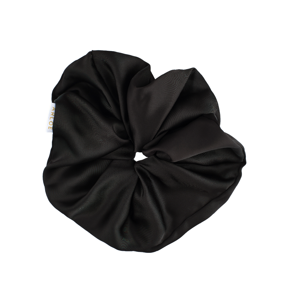 Black scrunchie on a white background