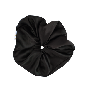 Black scrunchie on a white background