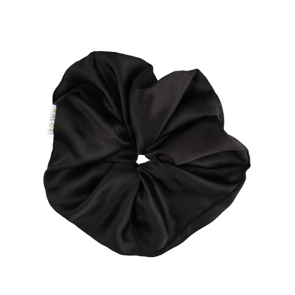 Black scrunchie on a white background