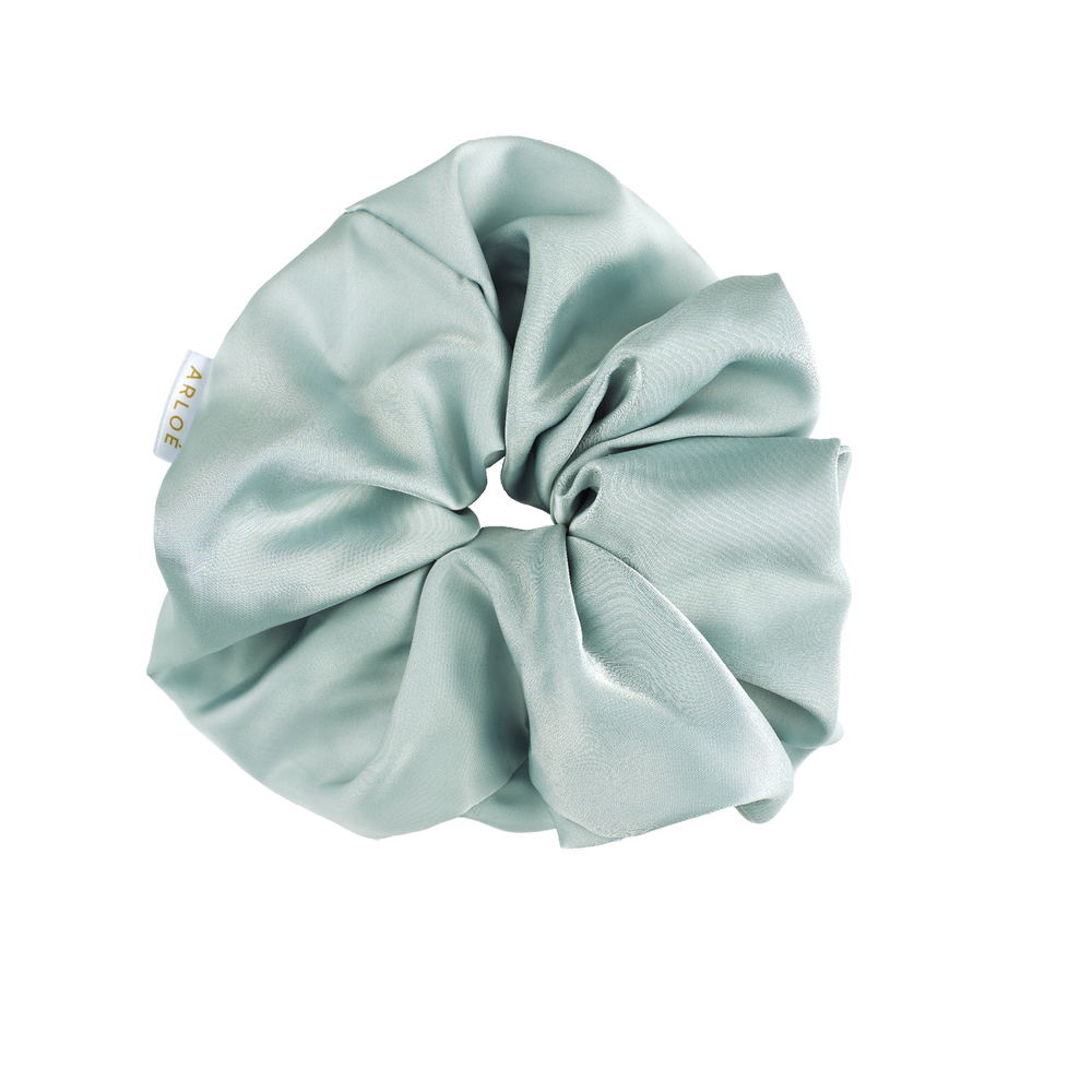 Light blue scrunchie on a white background