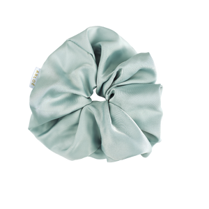 Light blue scrunchie on a white background