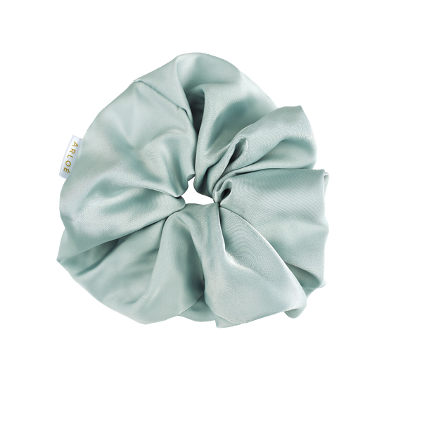 Light blue scrunchie on a white background