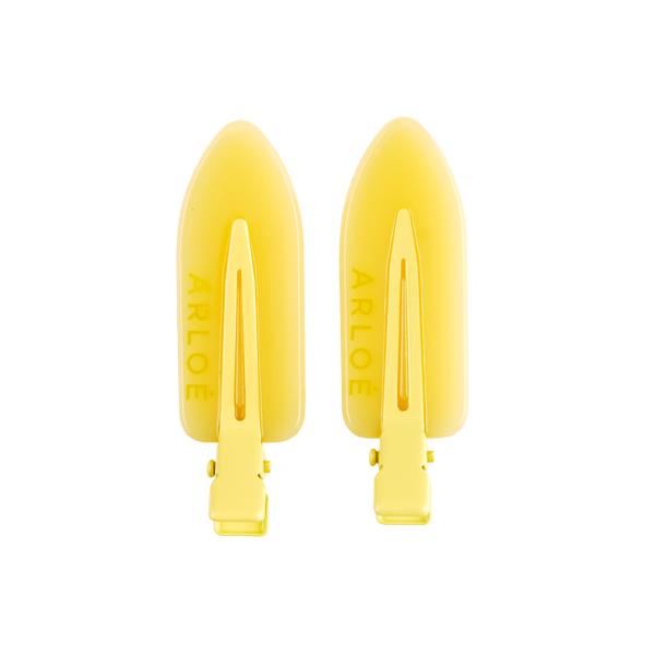 Two yellow ARLOE products on a white background