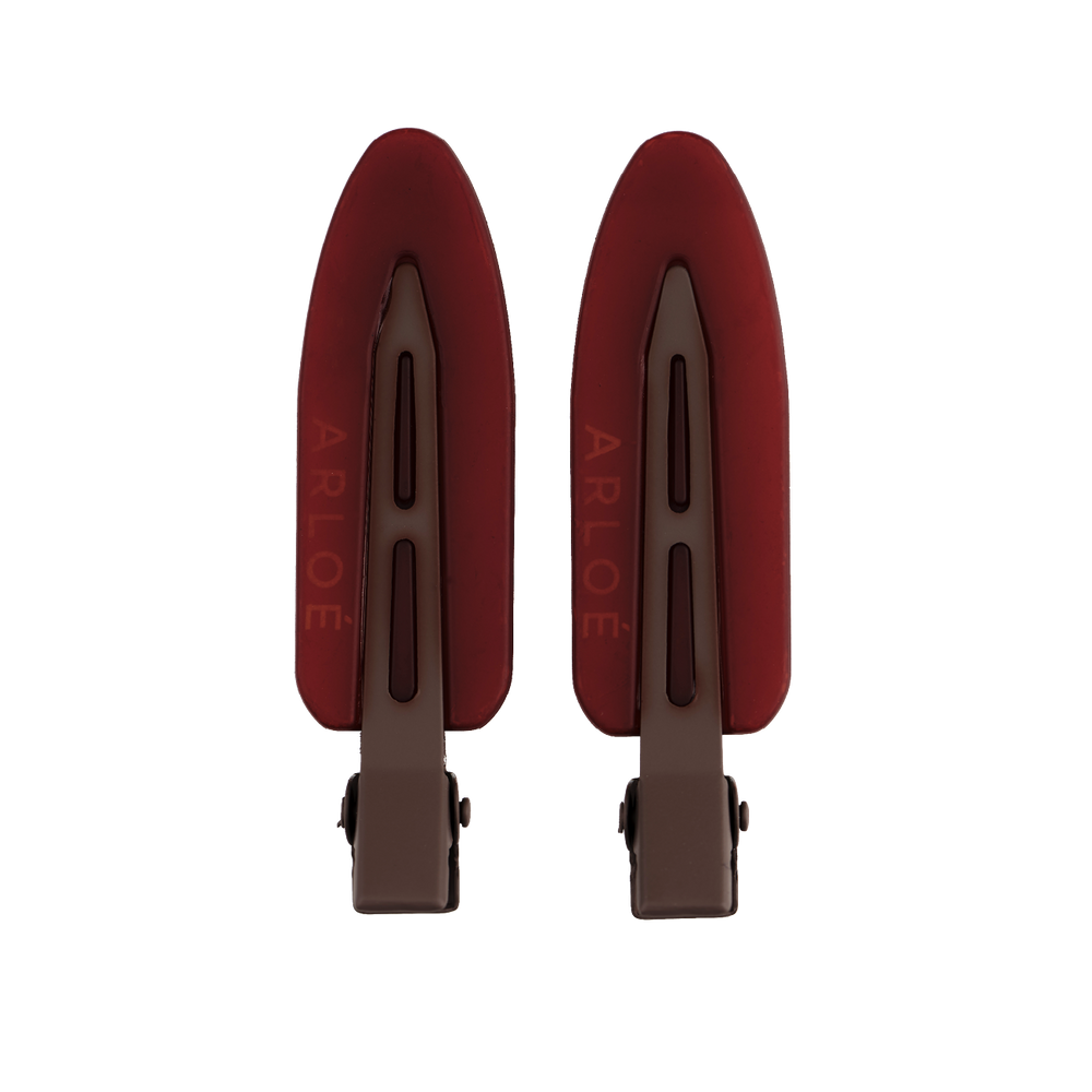 Two red shoe trees with 'ARLOE' branding on a white background