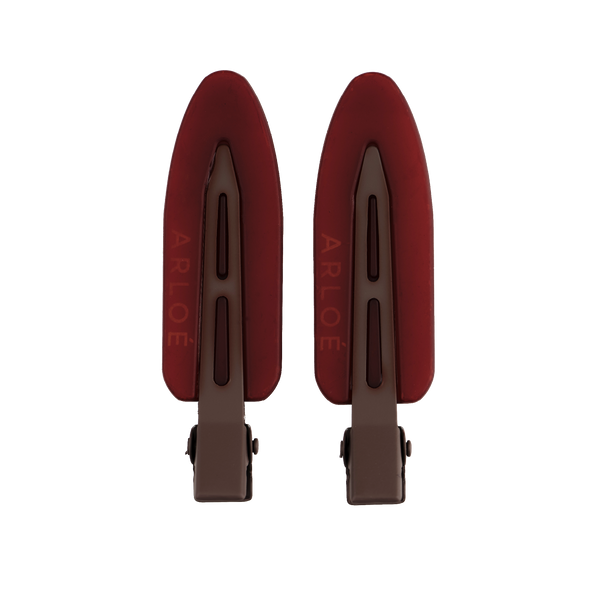 Two red shoe trees with 'ARLOE' branding on a white background