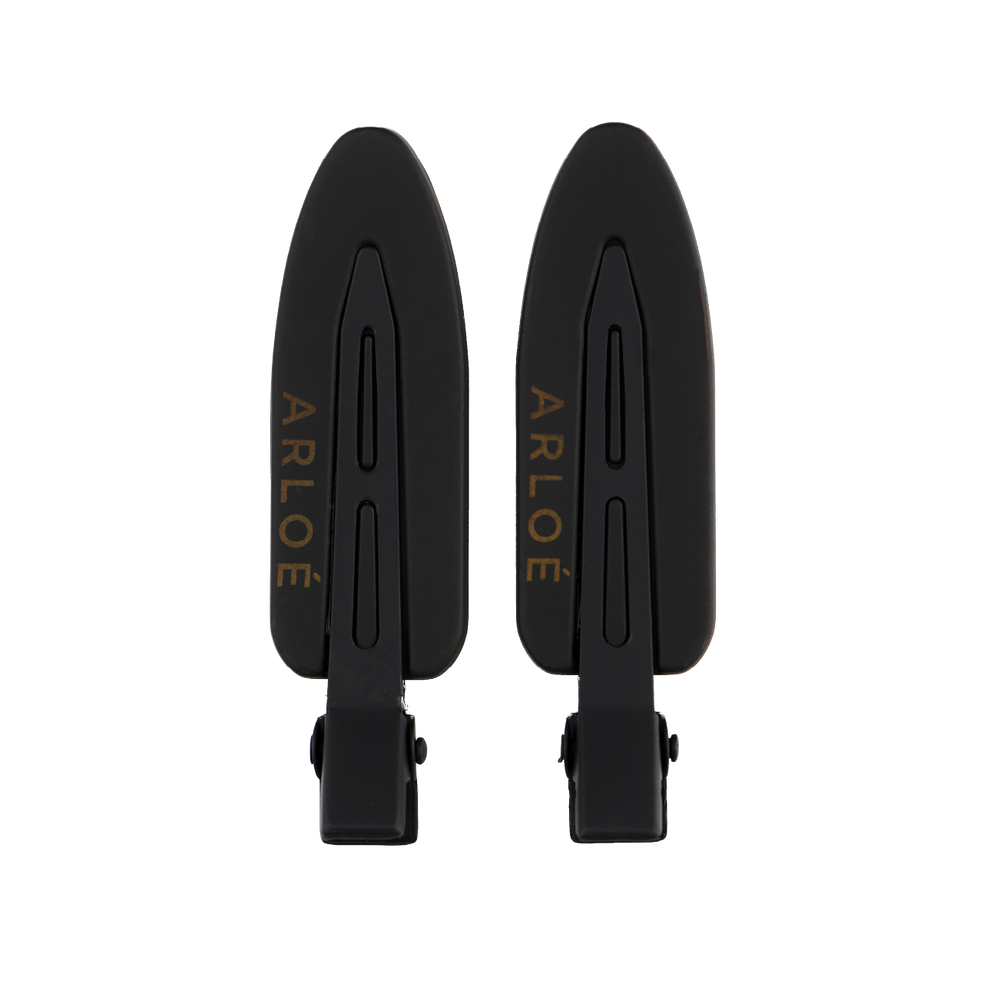 Two black hair clips with 'ARLOE' branding on a white background