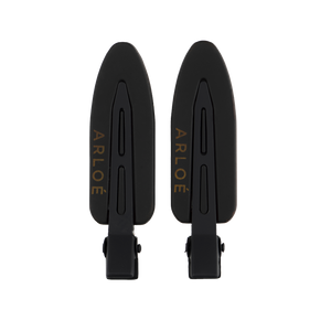 Two black hair clips with 'ARLOE' branding on a white background