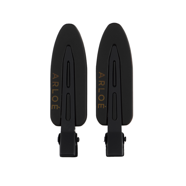 Two black hair clips with 'ARLOE' branding on a white background