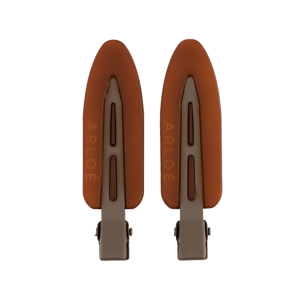 Two brown hair clips with 'ARLOE' branding on a white background